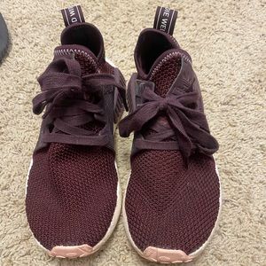 Maroon colored Adidas NMD’s